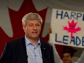 Conservative leader Stephen Harper delivers his campaign speech during a campaign stop in Mississauga, Ont., on Tuesday, September 8, 2015. (THE CANADIAN PRESS/Adrian Wyld)