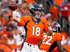 Denver Broncos quarterback Peyton Manning throws a pass against the San Francisco 49ers during the first half of an NFL preseason football game, Saturday, Aug. 29, 2015, in Denver. (AP Photo/Jack Dempsey)