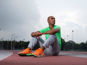 Decathlete Damian Warner poses for a photo on his home track at TD Stadium in London, Ont. on Friday September 4, 2015. The London athlete is currently resting following solid performances this summer at the Pan Am Games in Toronto and the IAAF World Championships in Beijing, China. (CRAIG GLOVER, The London Free Press)