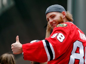 Chicago Blackhawks winger Patrick Kane gives a thumbs up to the crowd during the team’s Stanley Cup championship parade and rally at Soldier Field. (Jon Durr/USA TODAY Sports)