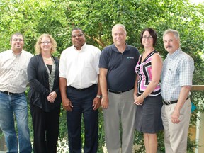 LEHDER Environmental Services is celebrating its 20th year in business in 2015. Six of LEHDER's seven principals stand in the firm's picturesque Point Edward offices. From left to right: Peter Pakalnis, Penny McInnis, Des Hayles, Mark Roehler, Marnie Freer and Sid Lethbridge. 
CARL HNATYSHYN/SARNIA THIS WEEK