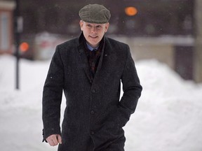Dennis Oland, charged with second-degree murder in the death of his father, arrives at the Law Courts in Saint John, N.B., on February 2, 2015. The trial begins jury selection today, Tuesday, September 8, 2015. (THE CANADIAN PRESS/Andrew Vaughan)