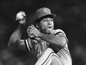 In this Oct. 15, 1982, file photo, St. Louis Cardinals pitcher Joaquin Andujar pitches in the first inning of Game 4 of the World Series against the Milwaukee Brewers at County Stadium in Milwaukee. (AP Photo/File)