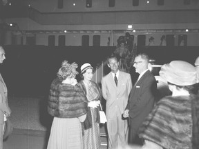 Queen Elizabeth II and Prince Philip are greeted by then Sarnia Mayor Iven Walker and his wife during their visit to the city on July 3, 1959. More than a half-century after that trip, Queen Elizabeth II has now become Britain's longest-reigning monarch. PHOTO COURTESY OF LAMBTON COUNTY ARCHIVES (SARNIA OBSERVER NEGATIVE COLLECTION NO.38200-19)