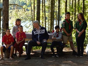 Conservative leader Stephen Harper meets with members of Scouts Canada as they make a campaign stop on the shores of McIvor Lake in Campbell River, B.C., on Aug. 21, 2015. (THE CANADIAN PRESS/Sean Kilpatrick)