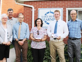 Lake Huron Learning recently presented local students Jennifer Pritchard (Goderich) and Michael Krane (Kincardine) with the 2015 Jean Marlatt Bursary. Pictured from left are Lynn Bearden, Jean’s daughter; Larry Kraemer, LHLC board chair; John Smallwood, LHLC board director; Jennifer Pritchard; Michael Krane; and Steve Marlatt, Jean’s son. (Contributed photo)