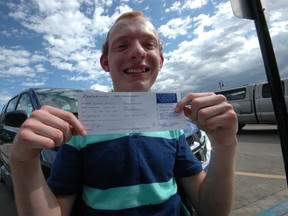 Aaron Friesen of Ranfurly poses with his just-received driver’s license in August. Friesen, who has cerebral palsy, set out to drive to school on his first day of Grade 12 at Delnorte School in Innisfree and accomplished that goal last week.