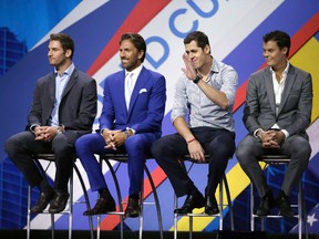 NHL players (from left) Brandon Saad, Henrik Lundqvist, Evgeni  Malkin and Tuukka Rask appear on stage during the NHL/NHLPA media event announcing details of the upcoming World Cup of Hockey in Toronto Wednesday September 9, 2015. (Craig Robertson/Toronto Sun/Postmedia Network)