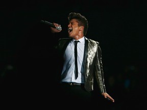 Bruno Mars performs during the halftime show of Super Bowl XLVIII between the Denver Broncos and the Seattle Seahawks in East Rutherford, NJ, in this February 2, 2014 file photo. (REUTERS/Carlo Allegri/Files)