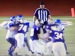 A pair of high school football players in Texas appeared to target this referee shortly after this still frame showing the play.