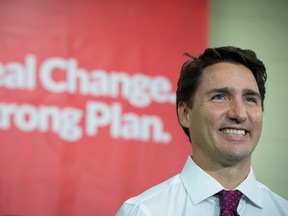 Liberal leader Justin Trudeau smiles prior to making an announcement in Toronto on Wednesday, September 9, 2015. THE CANADIAN PRESS/Jonathan Hayward