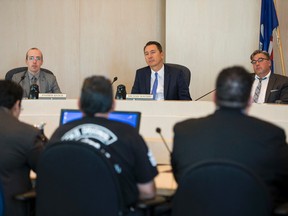 (Left to right) City coun. Andrew Knack, Michael Walters and Dave Loken listen as vaping advocate Khurram Bokhari  speaks against amending the Public Places Bylaw to include vapouriser smoking during a Community Services Committee meeting at City Hall in Edmonton, Alta., on Monday August 31, 2015. Ian Kucerak/Edmonton Sun