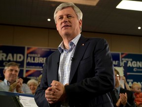 Conservative Leader Stephen Harper speaks during a rally with supporters during a campaign stop in Kitchener Wednesday September 9, 2015. (THE CANADIAN PRESS/Adrian Wyld)