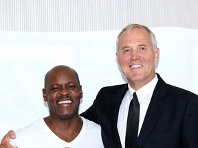Toronto Police Chief Mark Saunders (left) poses with former chief Bill Blair during Blair's fundraising event at the Hilton on Aug. 28 in Toronto. (Handout/Postmedia Network)