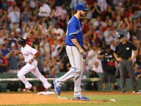 Drew Hutchison of the Toronto Blue Jays reacts after Mookie Betts of the Boston Red Sox hitting a solo home run at Fenway Park in Boston on September 9, 2015. (Maddie Meyer/Getty Images/AFP)