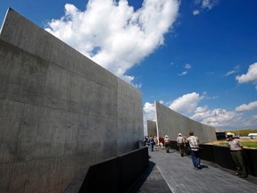 Members of the media get a preview of the the Flight 93 National Memorial visitors centre complex in Shanksville, Pa., Wednesday, Sept. 9, 2015. The centre will be formally dedicated and open to the public on Sept. 10, 2015. (AP Photo/Gene J. Puskar)