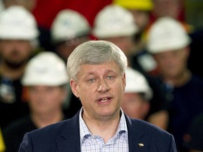Prime Minister Stephen Harper speaks at Laurel Steel on a campaign stop in Burlington, Ont., on Sept. 1, 2015. (REUTERS/Fred Thornhill)