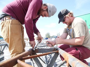 Félix Hallée-Théoret and Max Merrifield assemble the mainstage tent for Valley East Days in Hanmer, Ont. on Wednesday September 9, 2015. The 40th annual event runs from Friday, September 11 to Sunday, September 13 at the Hanmer Valley Shopping Centre and other spots in Hanmer. Canadian country star Aaron Pritchett headlines Friday night, with Honeymoon Suite on Saturday night and with family events scheduled throughout the day. For more information, go to www.valleyeastdays.com. Gino Donato/Sudbury Star/Postmedia Network