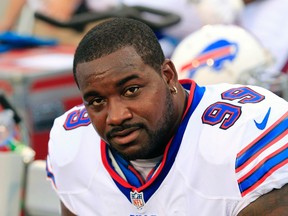 In this Aug. 14, 2015, file photo, Buffalo Bills defensive tackle Marcell Dareus (99) watches the action during the first half of an NFL preseason football game against the Carolina Panthers in Orchard Park, N.Y. (AP Photo/Bill Wippert, File)