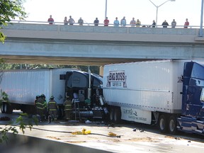 A collision Thursday morning closed westbound Highway 402 lanes at Christina Street. Two people were injured and one was being transported by air ambulance to hospital, police said. Tyler Kula/Sarnia Observer/Postmedia Network