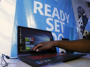 A Microsoft delegate checks applications on a computer during the launch of the Windows 10 operating system in Kenya's capital Nairobi, July 29, 2015. REUTERS/Thomas Mukoya