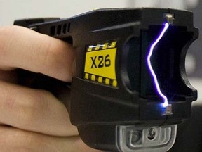 A X26 model Taser is pictured at a Taser International demonstration in Montreal in this August 26, 2008 file photo. (REUTERS File/Christinne Muschi)