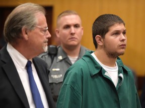 Tony Moreno, right, appears in Middletown Superior Court in Middletown, Conn., on Tuesday, July 21, 2015, with his lawyer, James McKay. Moreno is charged with murder in the death of 7-month-old Aaden Moreno. He is accused of throwing his infant son to his death off the Arrigoni Bridge and into the Connecticut River.  (Patrick Raycraft/The Courant via AP)