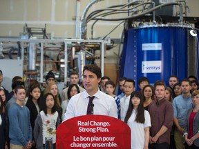 Liberal Leader Justin Trudeau makes his morning announcement as he tours Inventys Thermal Energy Inc. during an election campaign stop in Burnaby, B.C., Friday, September 11, 2015. THE CANADIAN PRESS/Jonathan Hayward