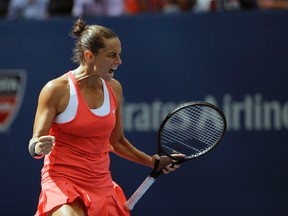 Roberta Vinci reacts after winning a point against Serena Williams during the U.S. Open semifinal match in New York on Friday, Sept. 11, 2015. (David Goldman/AP Photo)