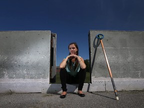 Talyor McCullough sits at a outdoor rink in Ottawa Ontario Friday Sept 4, 2015. Taylor has suffered two concussions in the past playing ringette. Tony Caldwell/Ottawa Sun/Postmedia Network