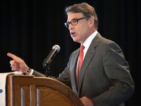 Republican presidential candidate, former Texas Gov. Rick Perry speaks at during the Eagle Council XLIV, sponsored by the Eagle Forum,in St. Louis Friday, Sept. 11, 2015. During his speech Perry ended his second bid for the Republican presidential nomination, becoming the first major candidate of the 2016 campaign to give up on the White House. (AP Photo/Sid Hastings)