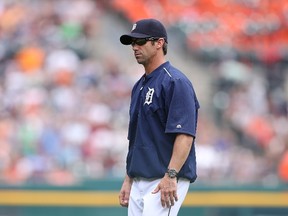 Brad Ausmus of the Detroit Tigers walks back to the dugout after making a pitching change during the fifth inning of the game against the Oakland Athletics on June 4, 2015 at Comerica Park in Detroit, Michigan. Leon Halip/Getty Images/AFP