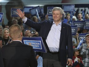 Conservative leader and Canada's Prime Minister Stephen Harper waves during a campaign event in Ottawa on Friday, Sept. 11, 2015. Canadians go to the polls in a federal election on October 19, 2015. 
REUTERS/Chris Wattie