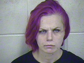 This photo made available by the Jackson County Detention Center on Saturday, Sept. 12, 2015, shows Brittany Mugrauer. The 24-year-old mother is in custody after her dirty, barefoot four- and six-year-old children were found living in a wooden shipping crate in an underground cave on the eastern edge of Kansas City, Mo. (Jackson County Detention Center via AP)