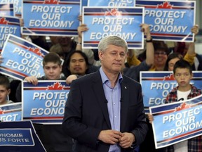 Conservative leader Stephen Harper pauses while speaking during a campaign event at a factory in Stittsville, Ont., on Sept. 13, 2015. (REUTERS/Chris Wattie)