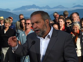 NDP leader Tom Mulcair makes a campaign stop at Spanish Banks Beach Park in Vancouver, B.C. on Sunday, September 13, 2015.  THE CANADIAN PRESS/Sean Kilpatrick