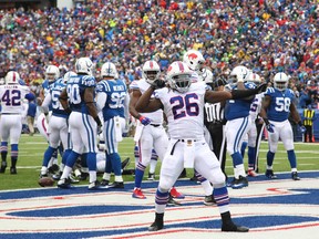 Buffalo Bills running back Boobie Dixon celebrates his touchdown against the Indianapolis Colts at Ralph Wilson Stadium in Orchard Park, N.Y., on Sept. 13, 2015. (AP Photo/Bill Wippert)