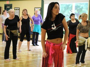 Toronto belly and flamenco dancer Anjelica Scannura leads a class on Saturday September 12, 2015 in Sarnia, Ont. The 26-year-old, who has taught dance internationally, drew a crowd of about 25 dancers from across Southwestern Ontario for a five-hour workshop at the Strangway Centre. (Barbara Simpson, The Observer)