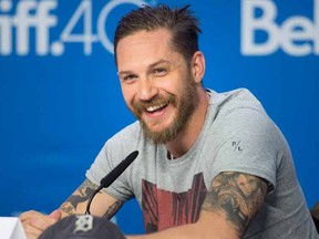 Actor Tom Hardy laughs during a press conference promoting the film "Legend" during the 2015 Toronto International Film Festival in Toronto on Sunday, September 13, 2015. THE CANADIAN PRESS/Darren Calabrese