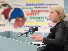 MPP Deb Matthews addresses the Syrian refugee crisis during a news conference Sunday at the Islamic Centre of Southwestern Ontario in London. Matthews reiterated a call made by Premier Kathleen Wynne a day earlier for the federal government to speed up the process of bringing Syrian refugees to Canada, saying London is ready to accommodate ?hundreds? of the displaced people. (CRAIG GLOVER, The London Free Press)
