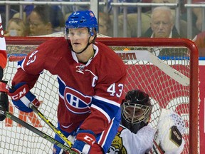 Montreal Canadiens forward Daniel Carr skates away after falling into Senators goaltender Matt O'Connor during their NHL Rookie Tournament hockey game at Budweiser Gardens in London, Ont. on Sunday September 13, 2015. 
Craig Glover/Postmedia Network