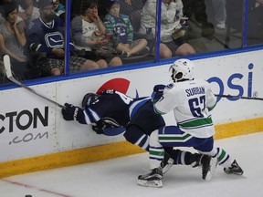 Things got heated when Canucks defenceman Jordan Subban checked Ehlers into the boards from behind. (PERRY MAH/Edmonton Sun)