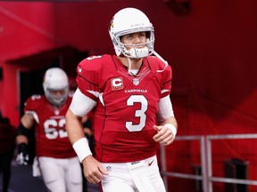 Carson Palmer was dominant for the Cardinals on Sunday. (AFP/PHOTO)