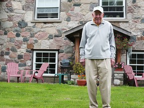 Ken Doig Sr. stands in front of the house he grew up in 82 years ago, which is located on the Seaforth Golf & Country Club. (Shaun Gregory/Huron Expositor)