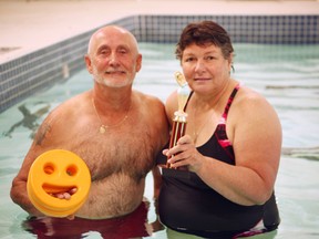 Coun. Ray Chartrand and Janet Boot competed in a friendly battle in the swimming pool at the Vanastra Recreation Centre to raise money for the construction of the building. (Shaun Gregory/Huron Expositor)