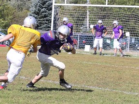 Members of the Lo Ellen Knights senior boys football team, run through some drills during team practice in Sudbury, Ont. on Monday September 14, 2015. The Knights are last year's defeanding city champions.