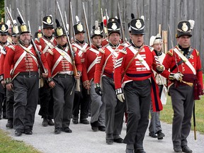 Victorious British regulars march back to camp after Sunday's War of 1812 re-enactment at Backus Heritage Conservation Area. (CHRIS ABBOTT/TILLSONBURG NEWS)