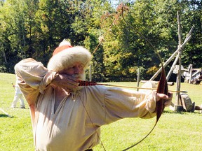 Re-enactor Ed Maxwell of Paisley, took part in games at last year's Mountain Man 1838 Rendzevous held at Backus Mill. The 19th Century trade meetings between pioneers and aboriginals were replicated in detail. (File Photo)
