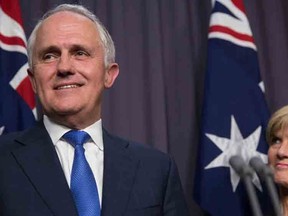 Malcolm Turnbull with deputy leader Julie Bishop comments after an Australian Liberal Party meeting where he has been elected at the new party leader  at Parliament House in Canberra, Monday, Sept. 14, 2015. Turnbull will replace Tony Abbott as Australian Prime Minister. (AP Photo/Andrew Taylor)