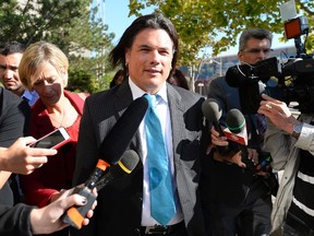 Sen. Patrick Brazeau, a former member of the Conservative caucus, leaves the courthouse in Gatineau after entering a guilty plea for charges on assault and possession of cocaine from incidents in 2013 and 2014 respectively, on Sept. 15, 2015. (THE CANADIAN PRESS/Justin Tang)